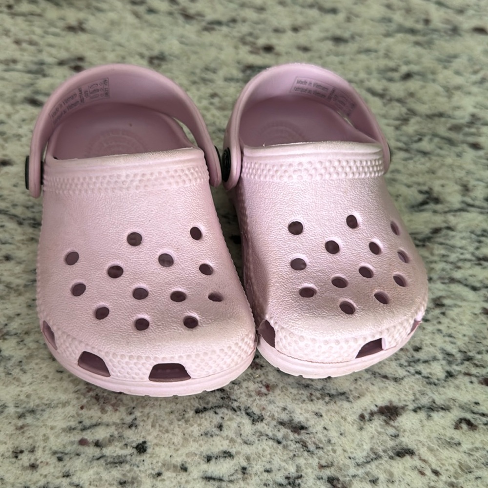 Pale pink Crocs